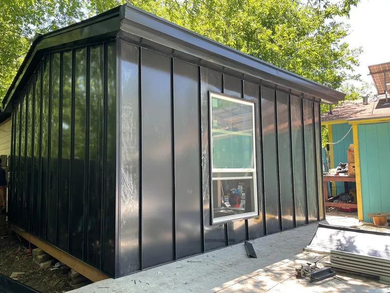 Black standing seam metal wall panels for Roof Inspection in Cresskill